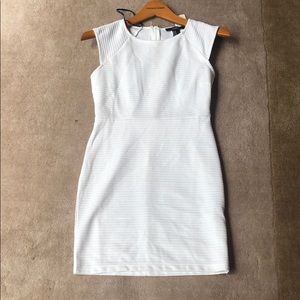 Bodycon white sparkle dress.